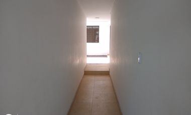 ESDIFICIO CON DOS LOCALES COMERCIALES Y TRES APARTAMENTOS.