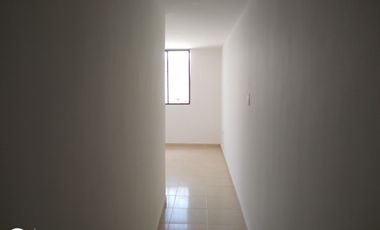 ESDIFICIO CON DOS LOCALES COMERCIALES Y TRES APARTAMENTOS.