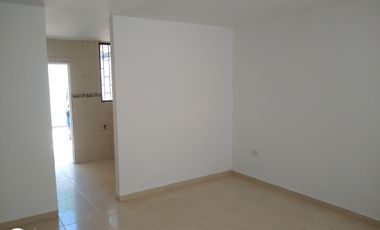 ESDIFICIO CON DOS LOCALES COMERCIALES Y TRES APARTAMENTOS.