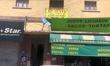 VENTA DE DOS LOCALES CON CASA EN ZONA CENTRO