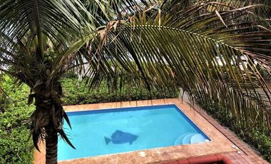 SOBRE LA PLAYA Casa y terreno en Puerto Morelos