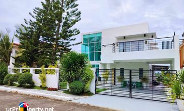 for sale white house with landscape garden in royale consolacion cebu