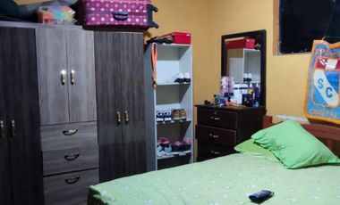 VENDO CASA EN ZONA COMERCIAL POR EL MERCADO MODELO DE PIURA