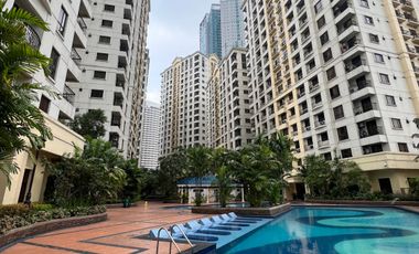 Forbeswood Heights 2BR condo with parking near Burgos Circle