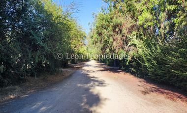Leon Propiedades vende hermosa parcela con casa en sector Challaco, Curacavi.
