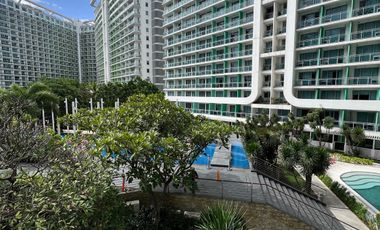 Azure condo with big patio facing amenities