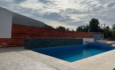 Parcela 5000 mt2 con casa Agua y Luz