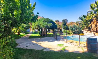 Leon Propiedades arrienda 2ha.con hermosa casa y piscina en sector Los Naranjos, Curacavi.