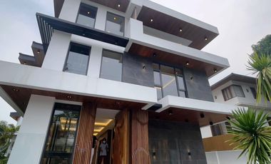 Exquisite 3-Storey Mansion in Ayala Alabang: Luxurious Living with 7 Bedrooms, Basement, and Space for 10-13 Cars!