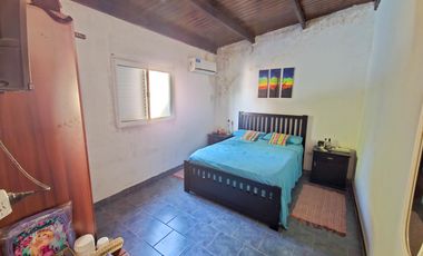 En venta: Casa + local a 50 mts. escuela en Romang
