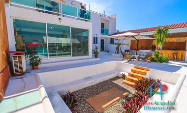 Casa en renta vacacional para 14 personas. Terraza con alberca privada, jardín y salida a la laguna