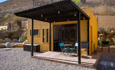 Terreno con cabañas amobladas para turistas y piscina, Valle del Elqui. $210 millones