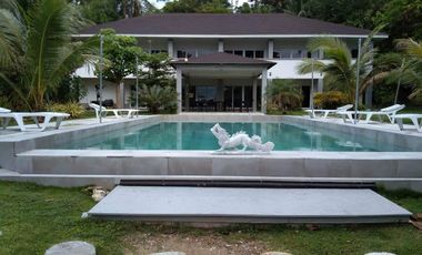 Beach & Dive Resort located on a beautiful white sand beach on Alad Island in the province of Romblon, Philippines.