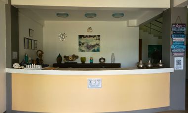 Beach & Dive Resort located on a beautiful white sand beach on Alad Island in the province of Romblon, Philippines.