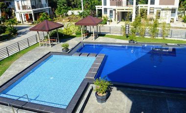 House in a secured subdivision with pool, clubhouse, playground