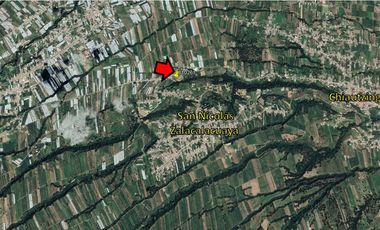 SE VENDE TERRENO CON CONSTRUCCIONES