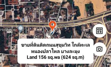 Land for sale with buildings Next to Sukhumvit Road, near the sea, Nong Pla Lai, Bang Lamung, Chonburi.