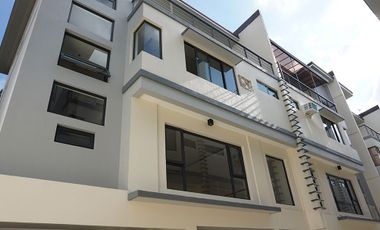 4 BR Exclusive Townhouse with Salt Water Pool for Sale in Quezon City