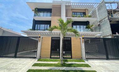 3 to 4 Car Port Garage House And Lot For Sale in Taguig City near Bonifacio Global City