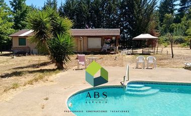 Parcela con casa y piscina, a pasos del centro de Quillón