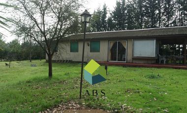 Parcela con casa y piscina, a pasos del centro de Quillón