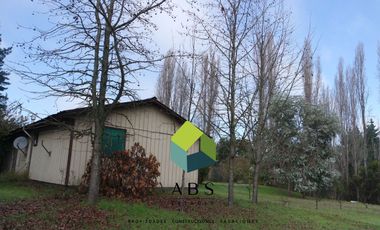 Parcela con casa y piscina, a pasos del centro de Quillón