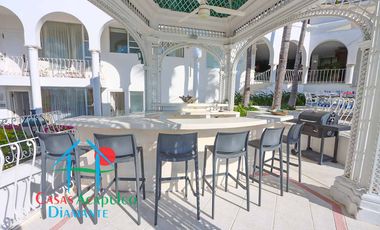 Casa en renta vacacional con alberca y áreas de jardín, sky roof, bar y asador
