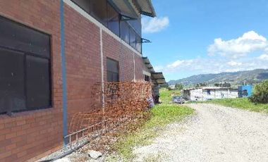 Excelente terreno en venta 10.000m2 mas Nave Industrial Vía Cumbe Cuenca