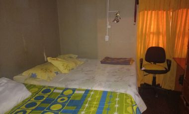 Casa y local comercial en comuna de San Joaquin