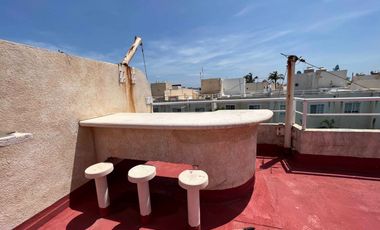 Roof garden con asador. Estancia con salida a las áreas comunes