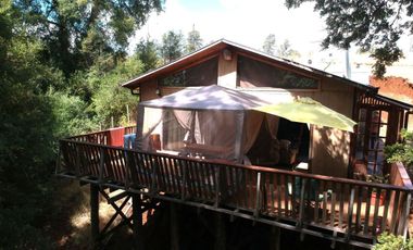 Parcela 5000 mt2 Chancoyan bajo, 2 casas $ 155.000.000.