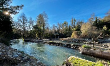 Se vende 90,5hás planas con agua, uso agricola y forestal, Molina