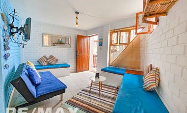 VENTA DE ACOGEDOR DEPARTAMENTO TIPO BUNGALOW CON TERRAZA, EN CONDOMINIO CERRADO PLAYA LOS PULPOS.