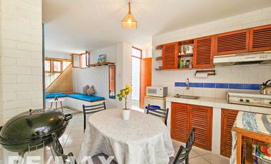 VENTA DE ACOGEDOR DEPARTAMENTO TIPO BUNGALOW CON TERRAZA, EN CONDOMINIO CERRADO PLAYA LOS PULPOS.