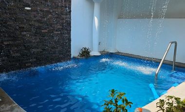 Casa remodelada con recamara en planta baja, terraza, alberca, cochera, Fracc. Moderno Veracruz