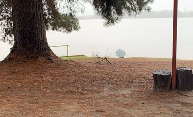 PARCELA CON CASA A ORILLA DE LAGO RAPEL