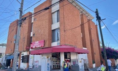 EDIFICIO DE DEPARTAMENTOS