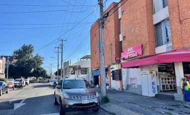 EDIFICIO DE DEPARTAMENTOS