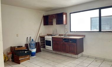 EDIFICIO DE DEPARTAMENTOS