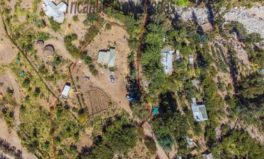 Terreno de 6.000 m2 con linda casa , cabaña y orilla de río, Cochiguaz, Valle del Elqui. $220 millones
