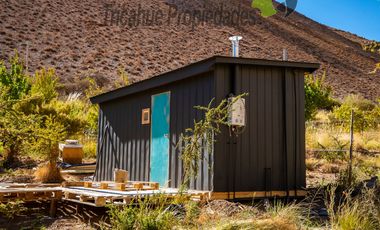 Terreno de 6.000 m2 con linda casa , cabaña y orilla de río, Cochiguaz, Valle del Elqui. $220 millones