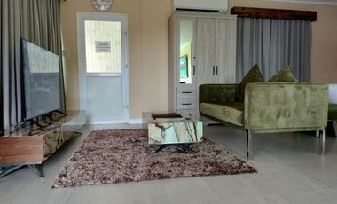 Finest Residential Service Property nestled in a tropical park with ocean view