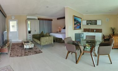 Finest Residential Service Property nestled in a tropical park with ocean view