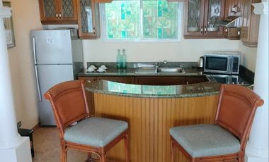 Finest Residential Service Property nestled in a tropical park with ocean view