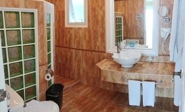 Finest Residential Service Property nestled in a tropical park with ocean view