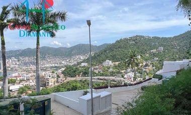 Departamento en venta, terraza con vista parcial a la bahía de Acapulco