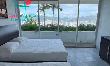 Departamento en venta, terraza con vista parcial a la bahía de Acapulco