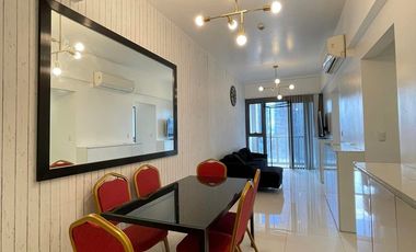 Fully furnished two bedroom corner unit with 2 balconies