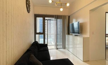 Fully furnished two bedroom corner unit with 2 balconies