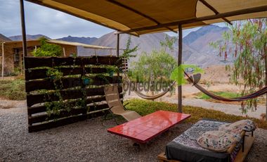 Venta de hermosa parcela de 10.000 m2, con 3 cabañas, agua de riego. Sector Mamalluca, Vicuña. $180 millones.
